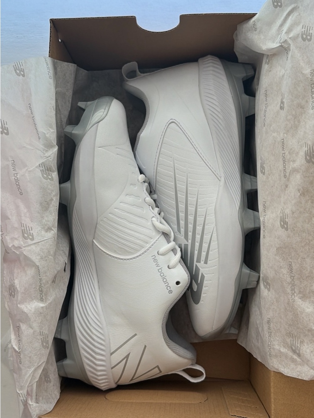 New Balance women’s White Athletic Cleats – All-White Performance